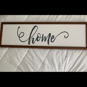 “Home” wooden sign